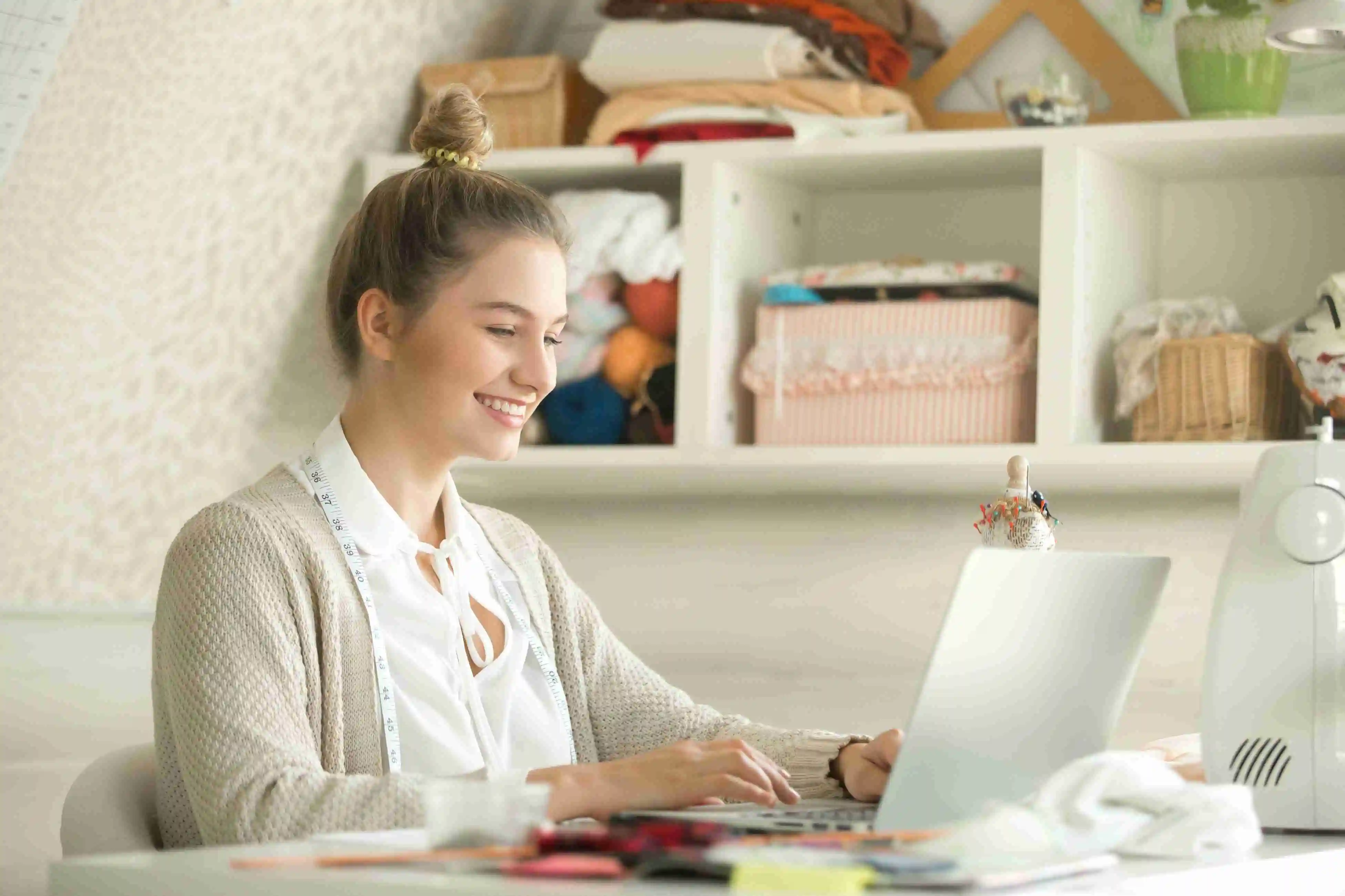 Teacher preparing digital assignments on a laptop